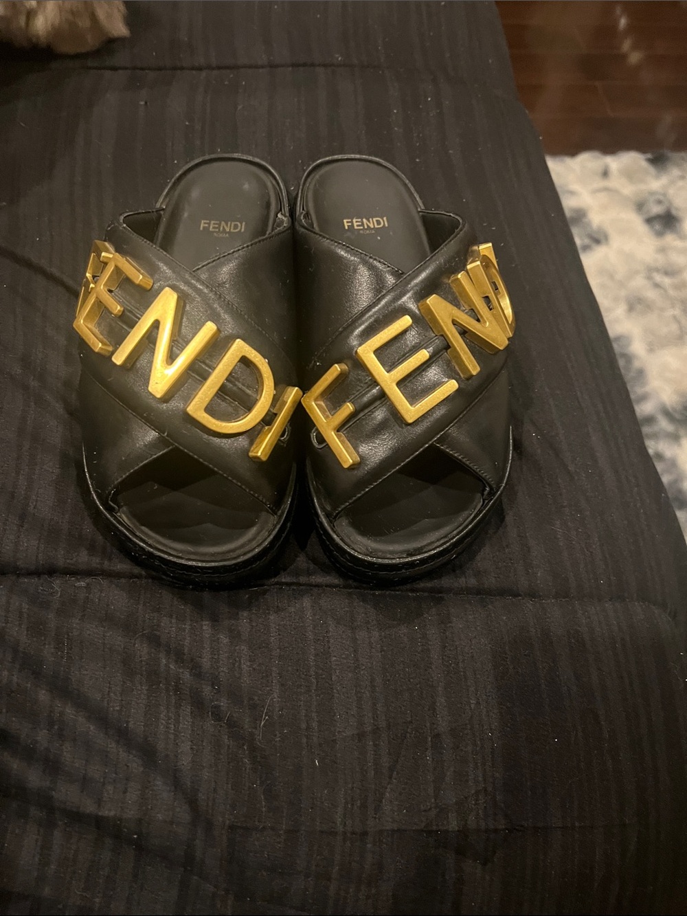 Fendi Black Leather Logo Slip-On Sandals with Gold Lettering